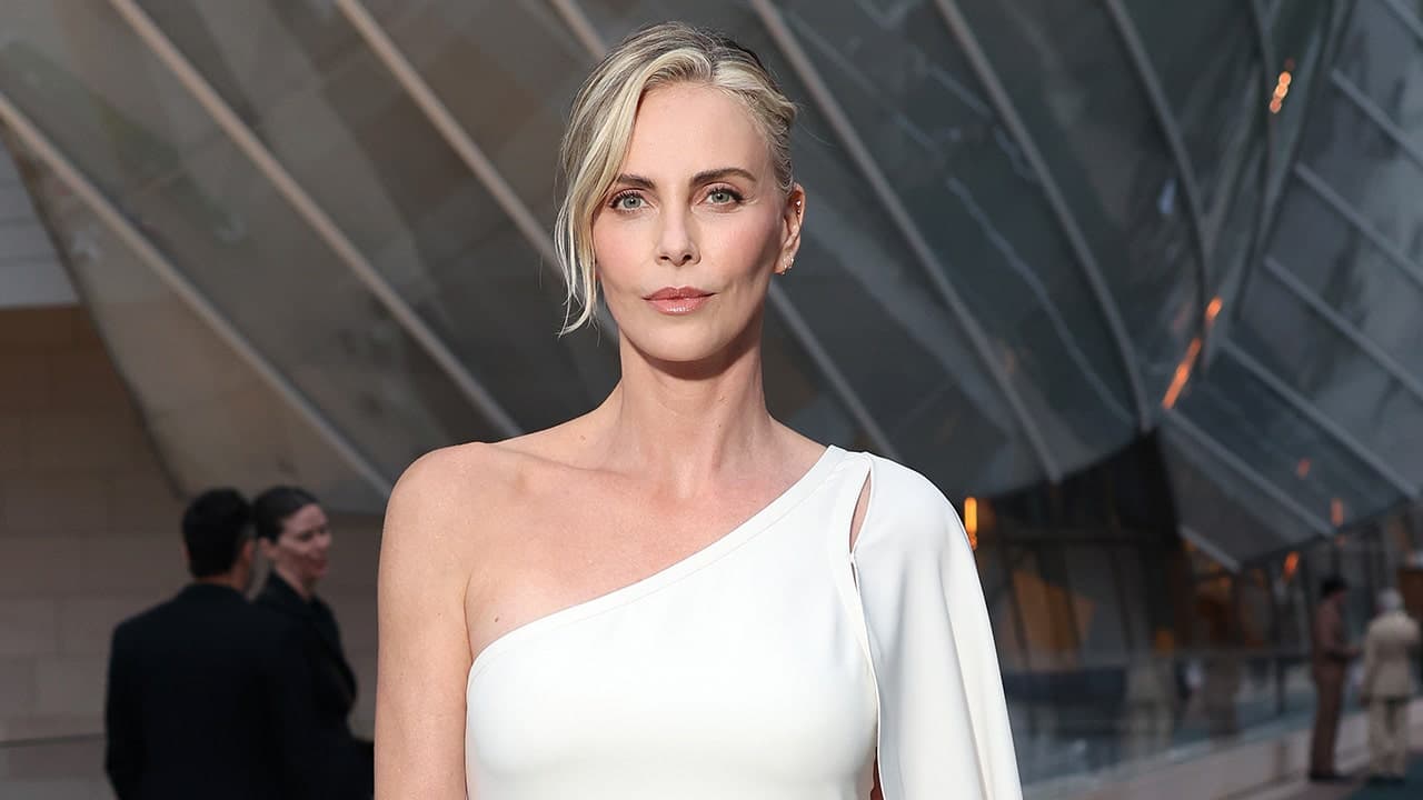 Charlize Theron says her adopted daughters will need summer jobs and must earn first cars; discussed financial independence on 'Therapuss' podcast