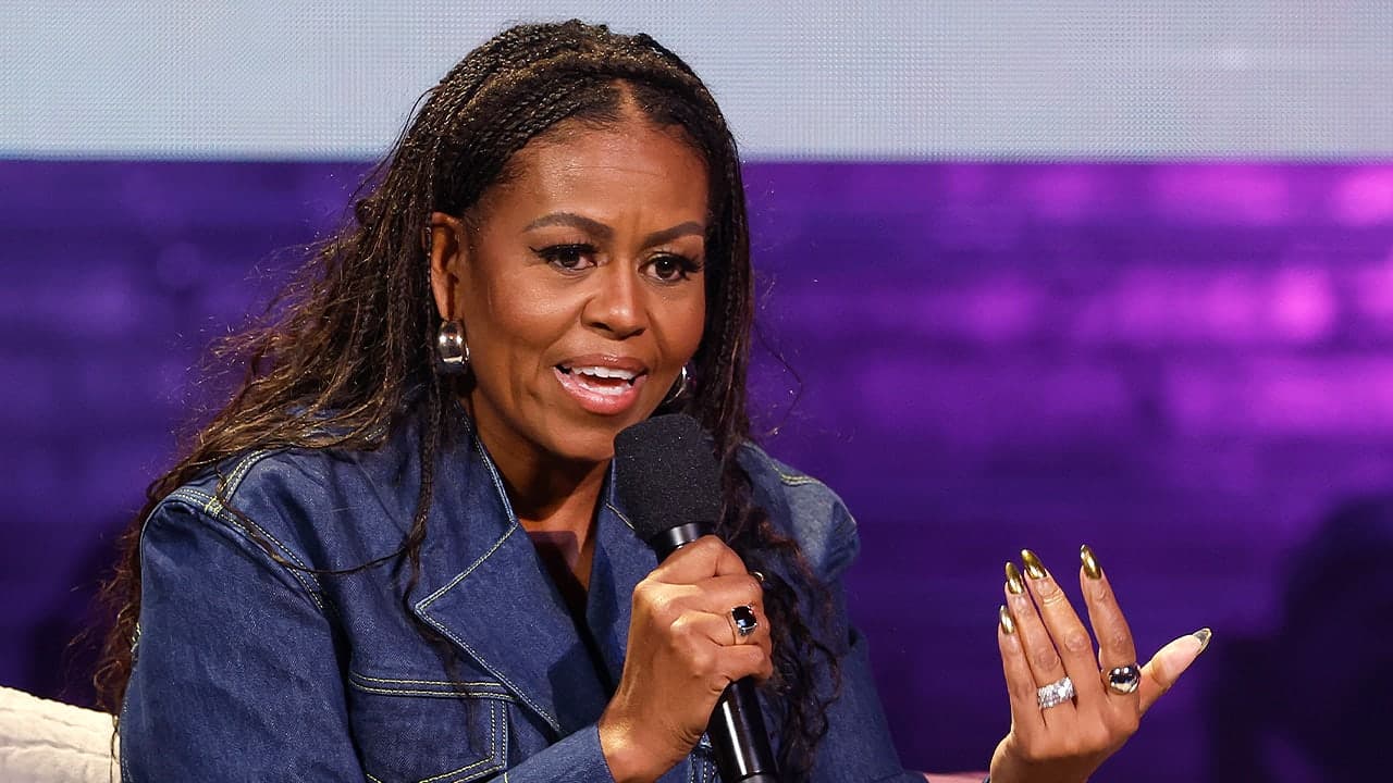 Michelle Obama says 'we have to pick leaders' who don't rob women of their femininity