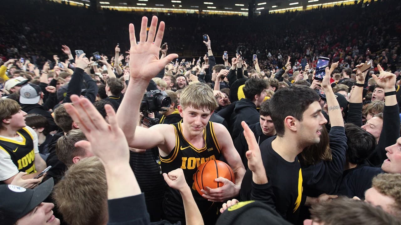 Court storm turns hectic as coach smacks fan's phone; school apologizes for forcing 'reactive situation'