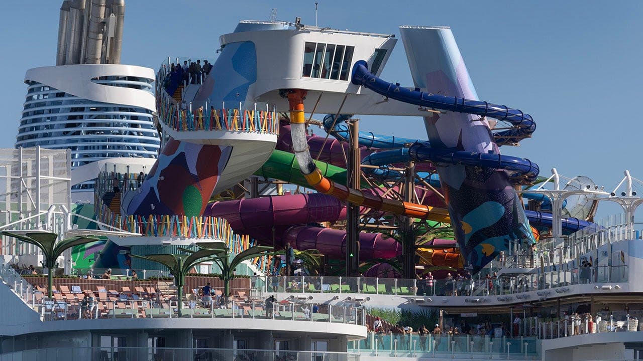 Passengers report water-slide and other onboard attraction closures on a major cruise ship without advance notice, prompting complaints