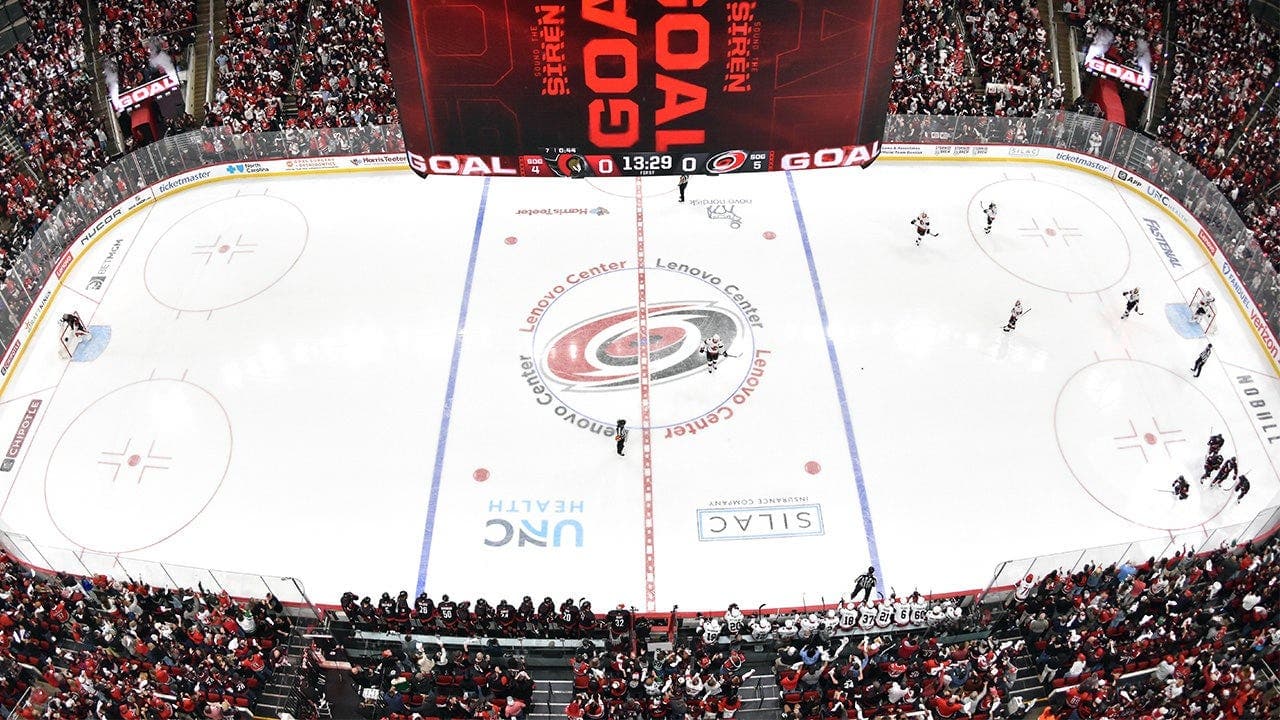 Carolina Hurricanes offer plastic 'beer skate' souvenir cups to fans at Lenovo Center during second-round series against Philadelphia Flyers
