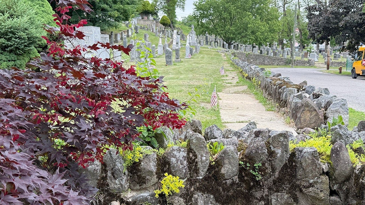 At Arlington National Cemetery, two veteran authors say Memorial Day requires ongoing commitments to honor the fallen