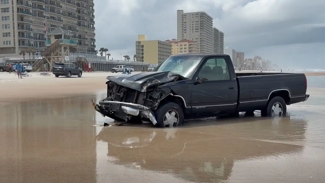 Toll booth attendant Tammy Jo Baker killed after pickup truck crashes into parking booth at Dunlawton Avenue beach access in Daytona Beach Shores; driver identified as Deanna Harrell