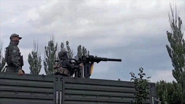Soviet-Era Helicopter Gun Spins, Soldier Thrown