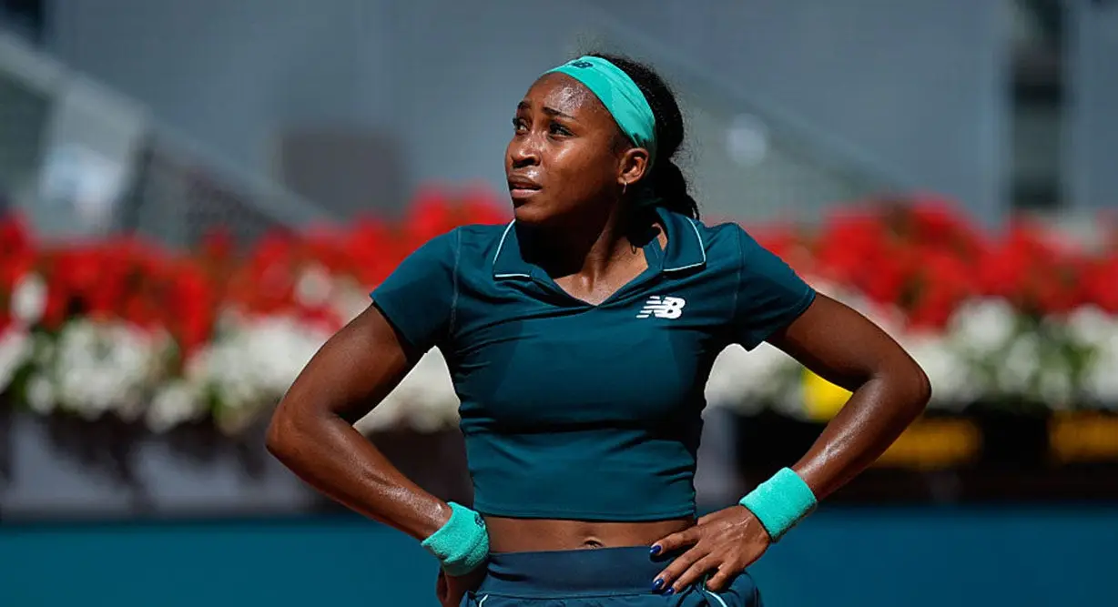 Coco Gauff vomits during Madrid Open match but defeats Sorana Cirstea; tournament cites gastroenteritis virus affecting multiple players