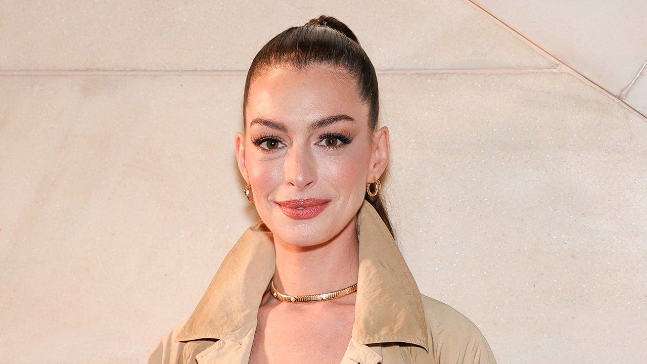 Anne Hathaway says early-onset cataract left her legally blind in left eye for about a decade; she had surgery around age 40