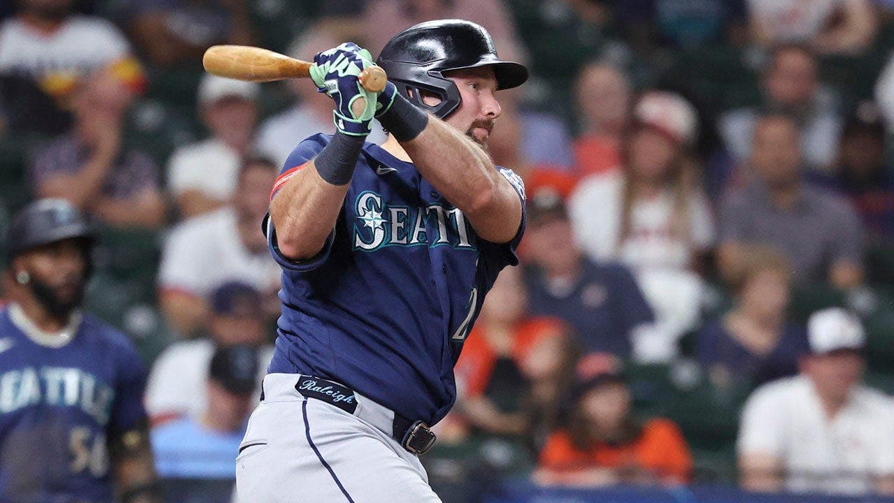 Cal Raleigh ends 0-for-38 single-season hitless streak, records two singles after reportedly showering in full uniform