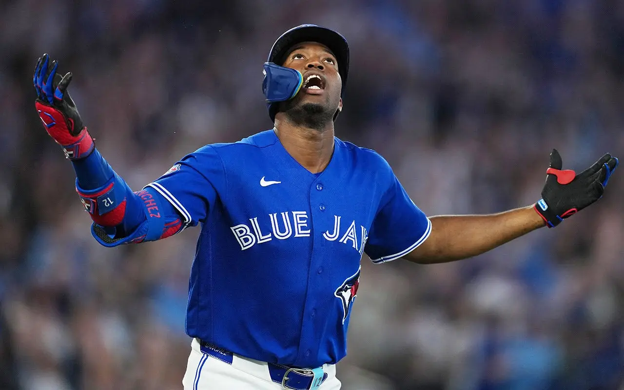 Toronto Blue Jays outfielder Jesús Sánchez exits after right wrist struck by ball thrown from stands at Camden Yards