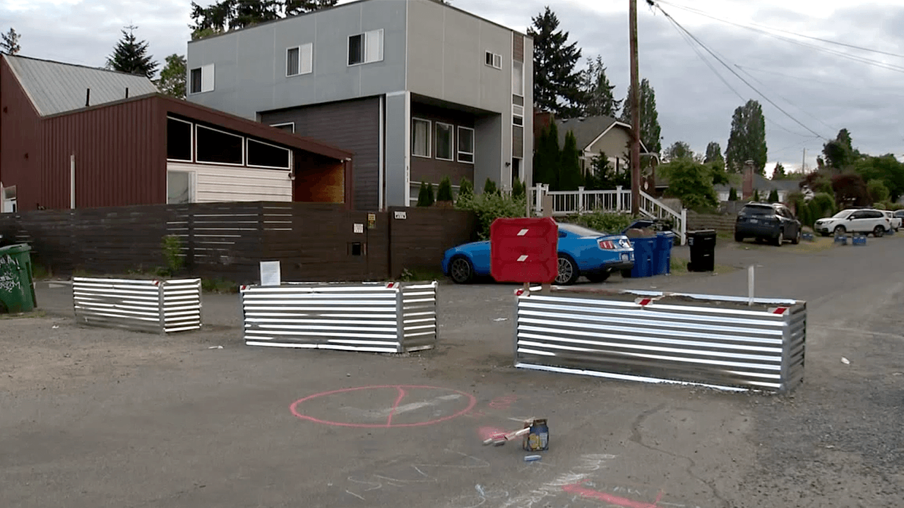 Seattle neighbors install makeshift street barricades after weekend shootout near Aurora Avenue North and N. 98th Street