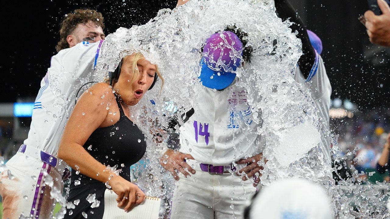 Royals' Celebration Douses Reporter Tricia Whitaker